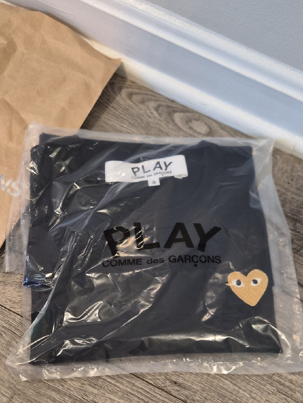 Comme des Garçons PLAY Black T-Shirt with White Label